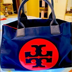 Tori Burch blue and red bag